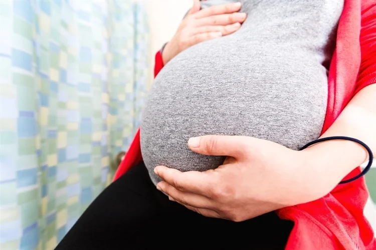 COVID-19 Linked to Adverse Perinatal Outcomes in a Study. Credit | Shutterstock